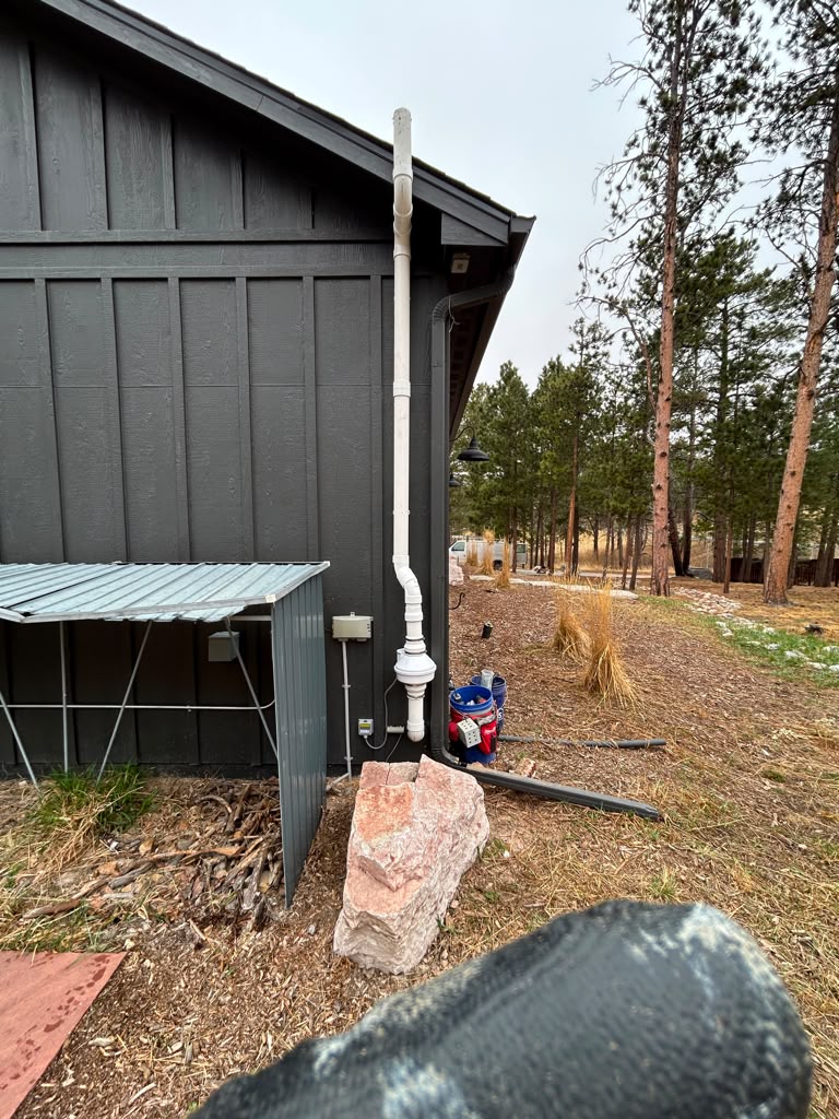 Radon mitigation back exterior