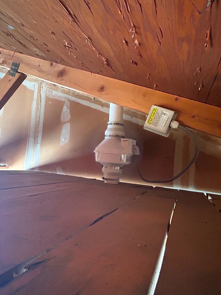 Radon system garage attic