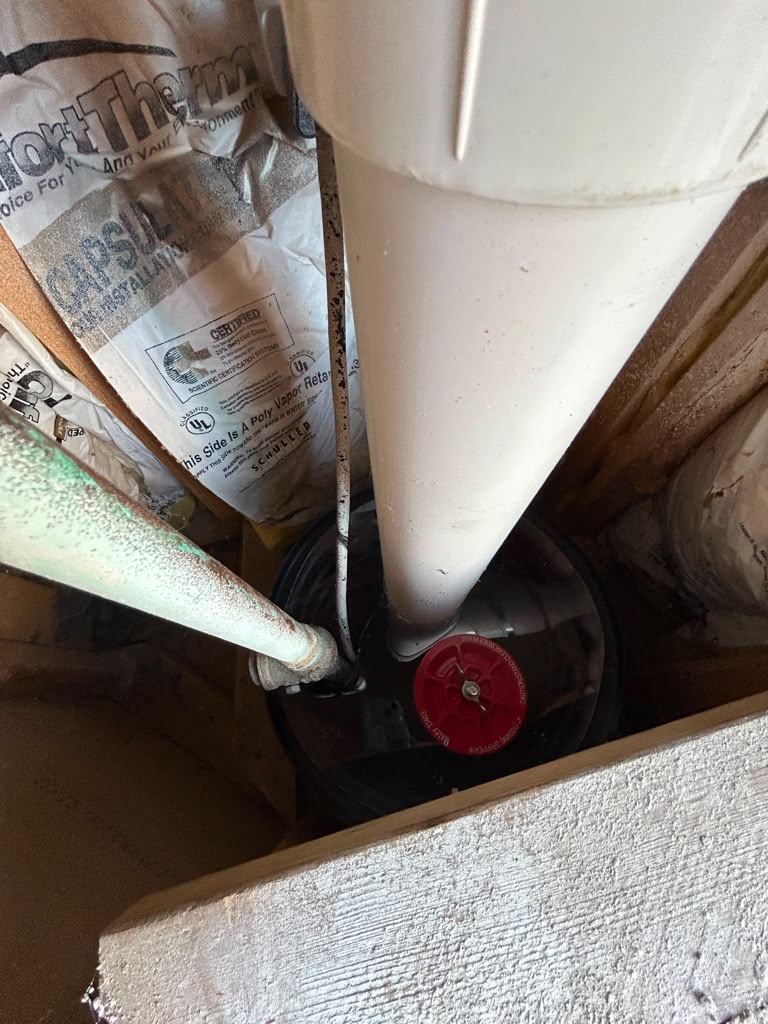 Interior radon mitigation system — sump pump system