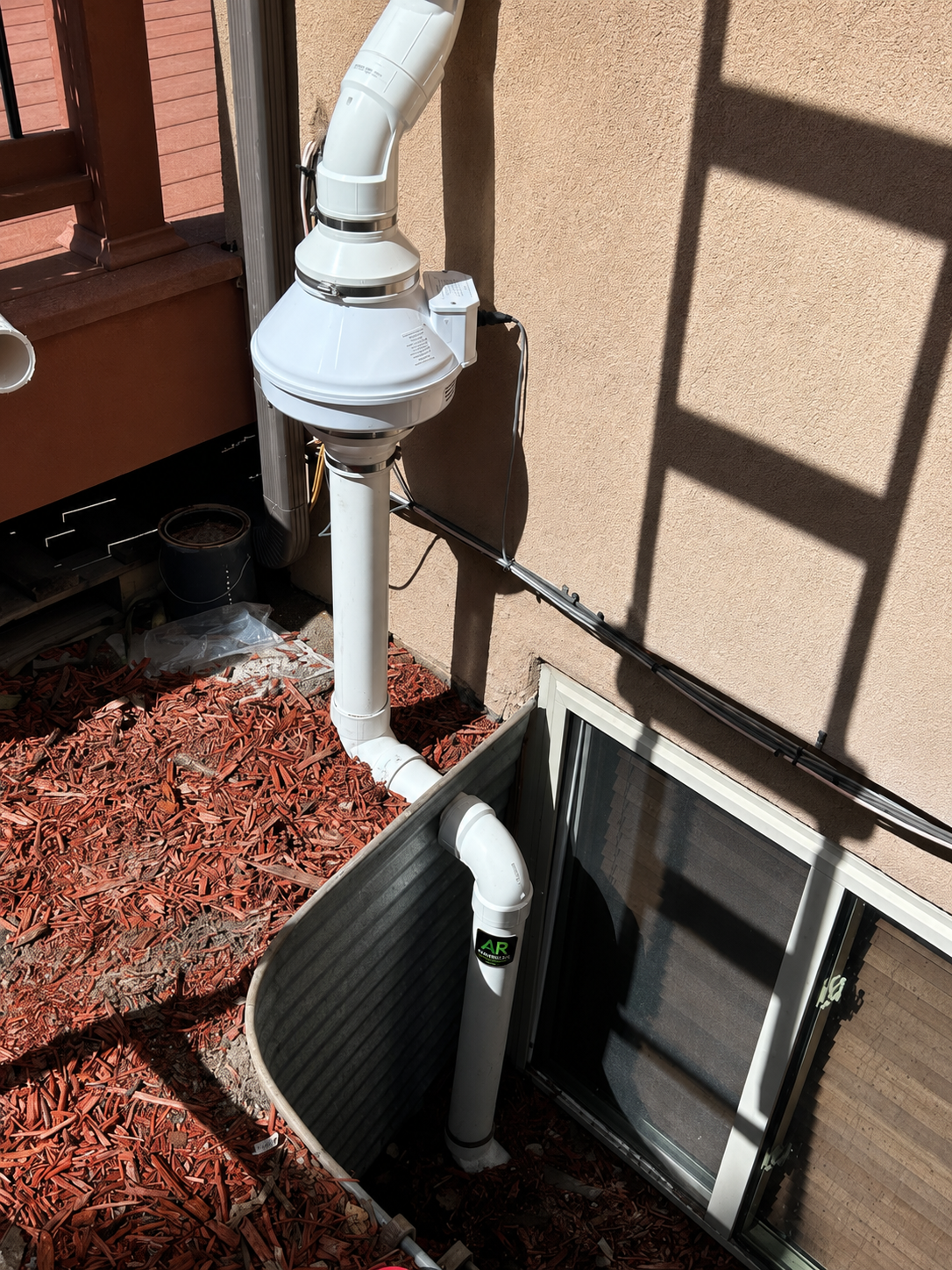 Radon mitigation foundation drain tile
