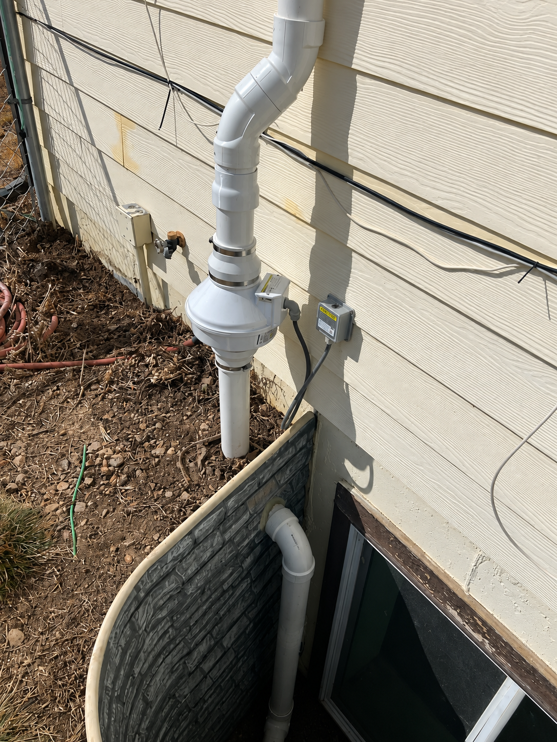 Exterior radon system mitigation